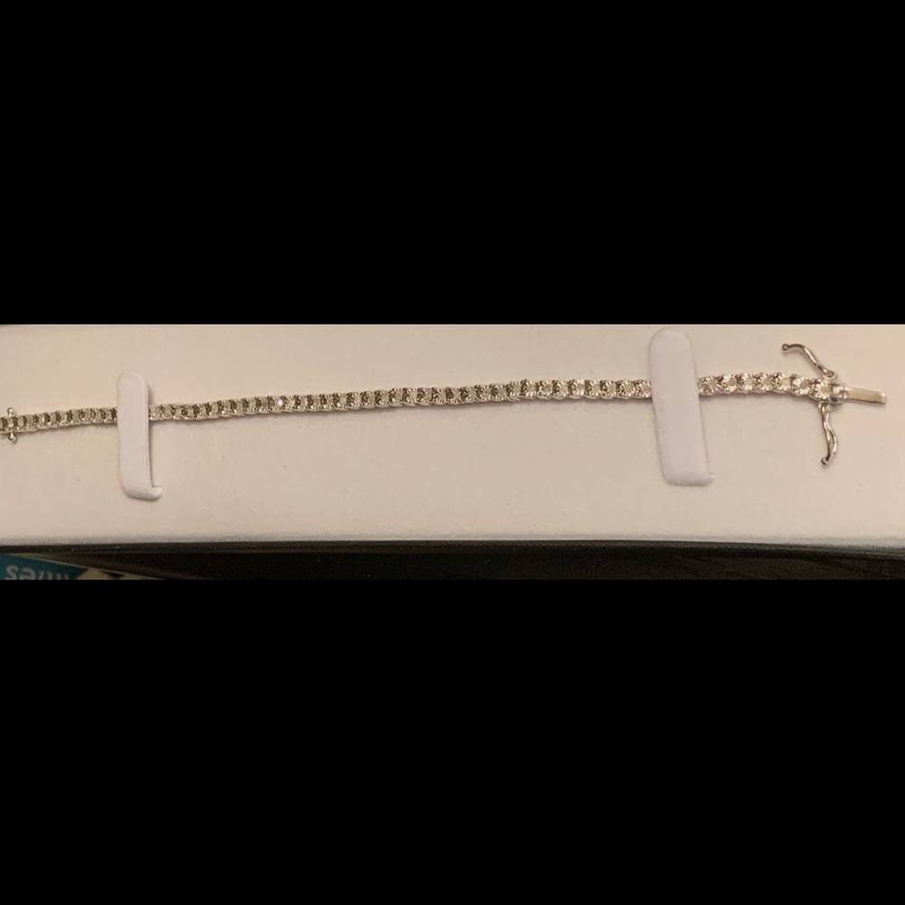Natural Diamond and Sterling Tennis Bracelet.